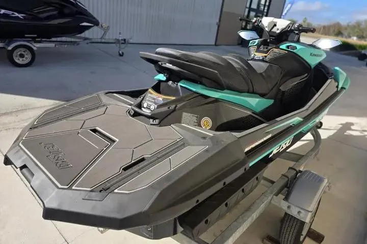 Slide: The Image of 2026 Kawasaki Jetski Ultra 310LX-S on trailer, showcasing sleek design and advanced features. - 6