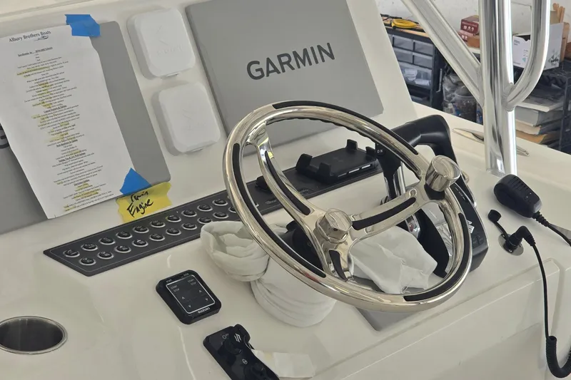 Slide: The Image of Helm of 2026 Albury Brothers 27 boat with Garmin navigation system. - 8