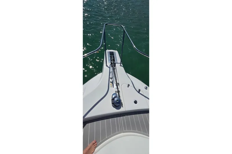 Slide: The Image of Bow view of 2007 Boston Whaler 305 Conquest on water. - 10