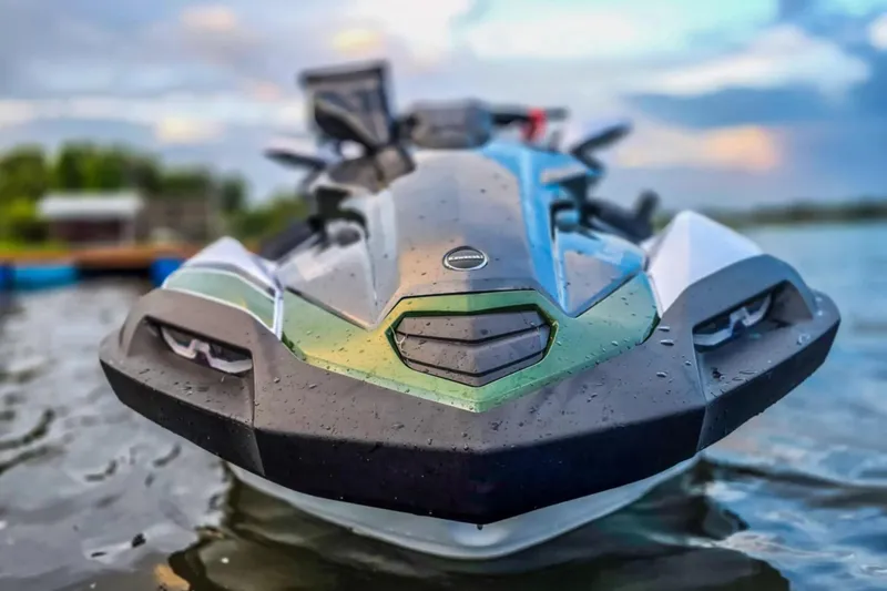 Slide: The Image of 2025 Kawasaki Ultra 160LX-S Angler jet ski on water, showcasing sleek design. - 13