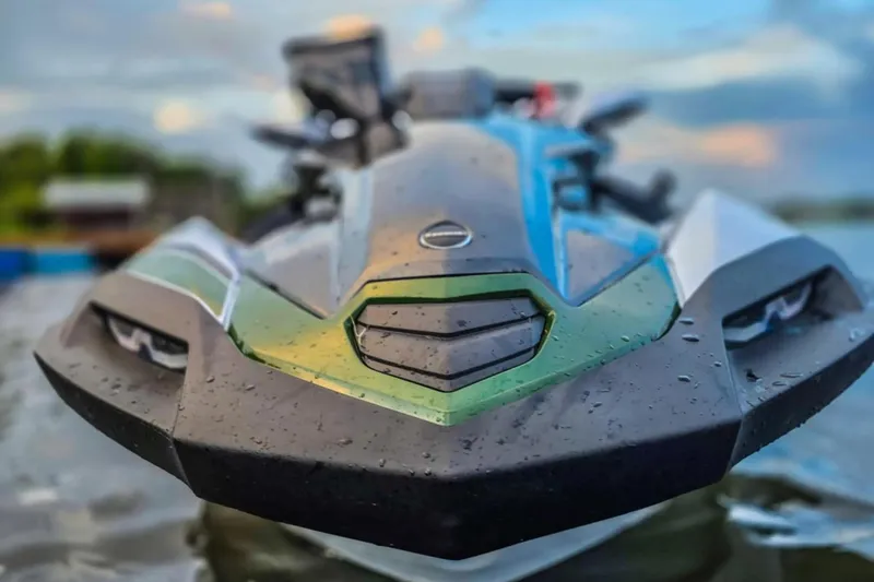 Slide: The Image of 2025 Kawasaki Ultra 160LX-S Angler jet ski on water, close-up front view. - 14