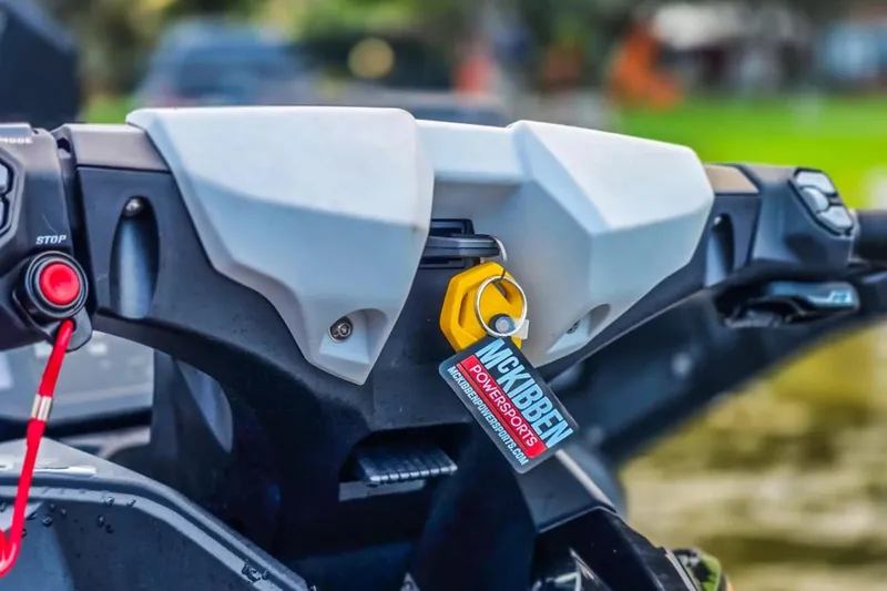 Slide: The Image of 2025 Kawasaki Ultra 160LX-S Angler dashboard with key and stop button. - 18