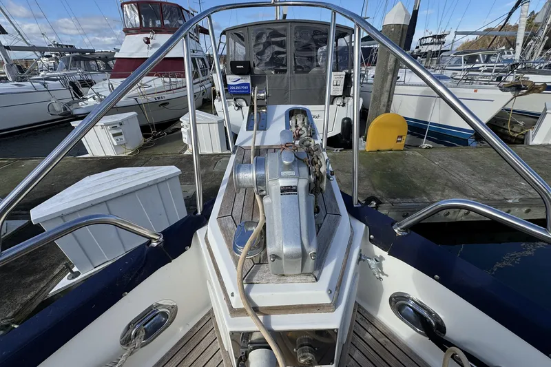 Slide: The Image of 1997 Grandbanks 36 yacht bow with anchor winch, docked at marina. - 41