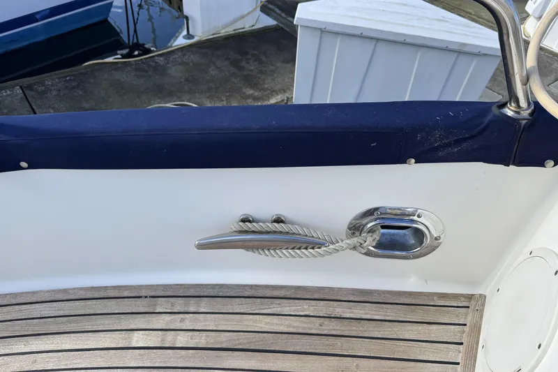 Slide: The Image of Deck of 1997 Grandbanks 36 boat with cleat and rope detail. - 49