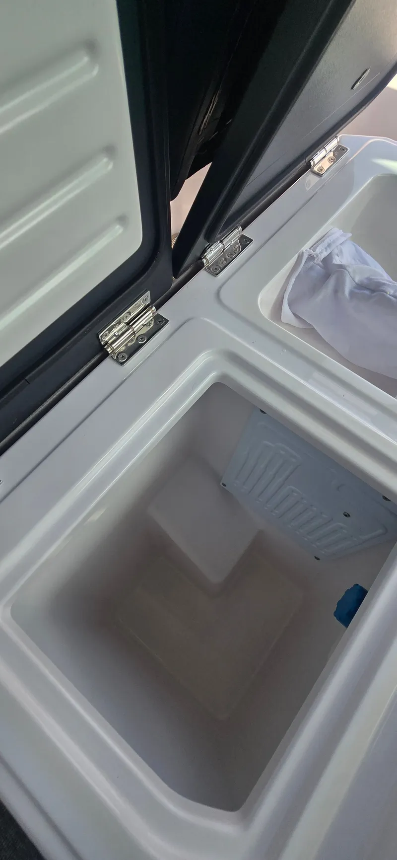 Slide: The Image of Open storage compartment in Axopar 29 boat, 2024 model. - 18