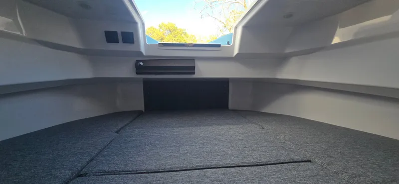 Slide: The Image of Interior of 2024 Axopar 29 yacht with gray upholstery. - 26