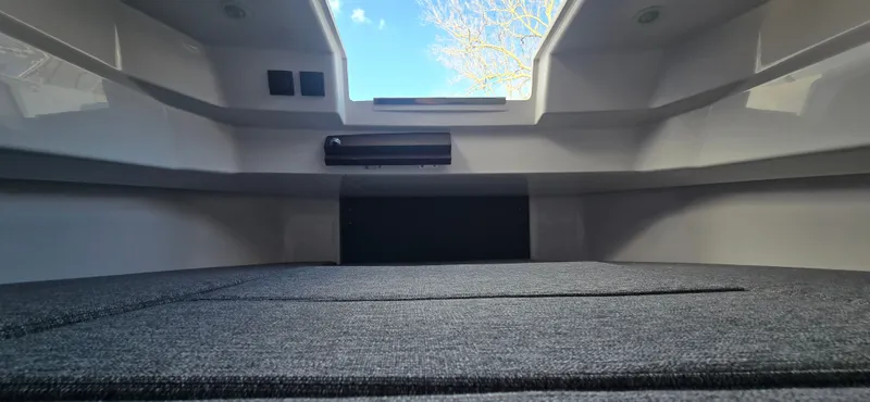 Slide: The Image of Interior of 2024 Axopar 29 with gray upholstery. - 27