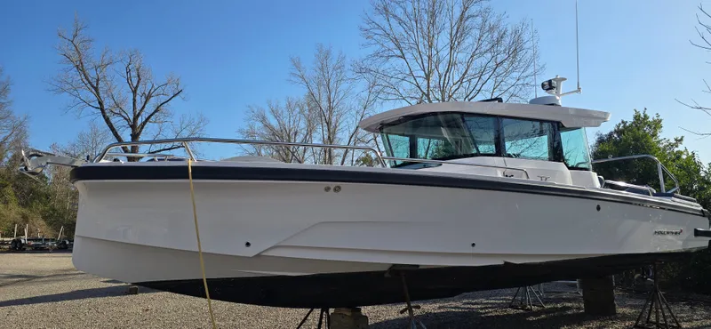 Slide: The Image of 2024 Axopar 29 boat on a dry dock. - 28