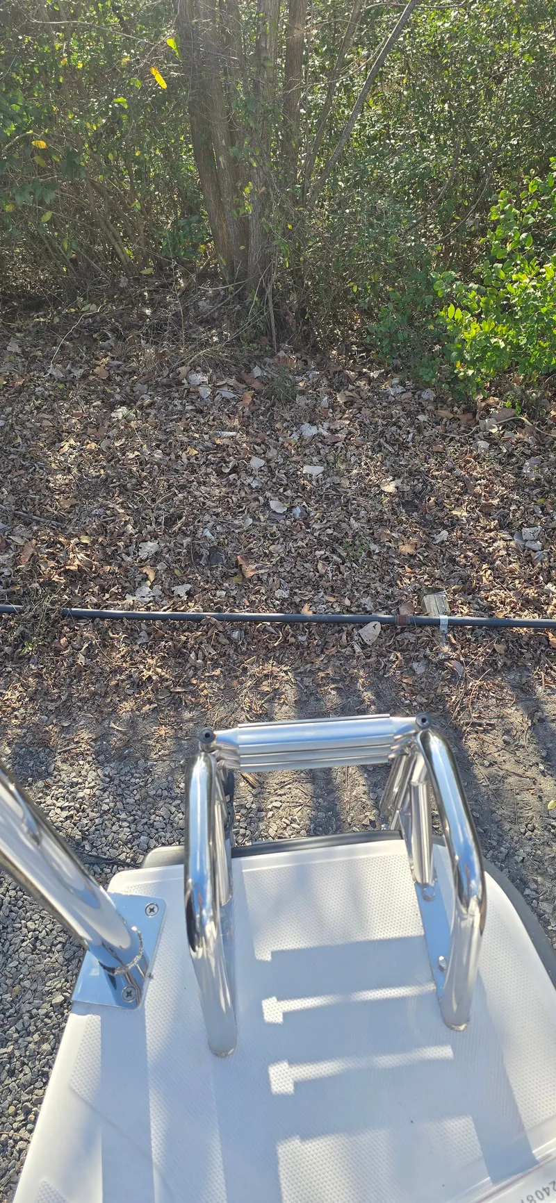 Slide: The Image of 2024 Axopar 29 boat ladder in a natural setting - 5