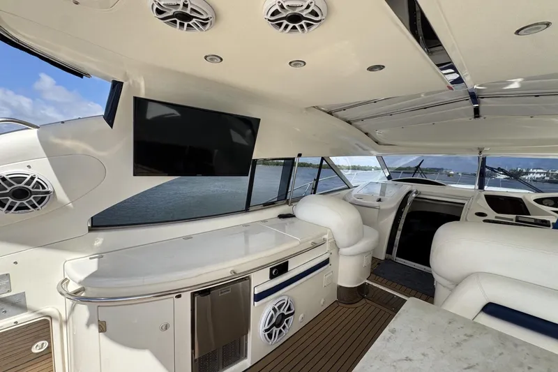 Slide: The Image of Luxurious interior of 2000 Sunseeker Predator 56 yacht with modern amenities and scenic view. - 12