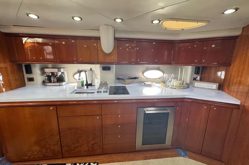 Slide: The Image of Luxurious kitchen interior of 2000 Sunseeker Predator 56 yacht with modern amenities. - 16