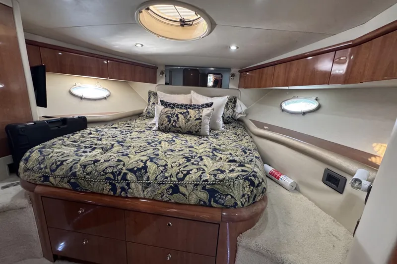 Slide: The Image of Luxurious cabin interior of 2000 Sunseeker Predator 56 yacht with elegant bedding. - 21