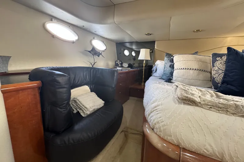 Slide: The Image of Luxurious interior of 2000 Sunseeker Predator 56 yacht with plush seating and elegant decor. - 27