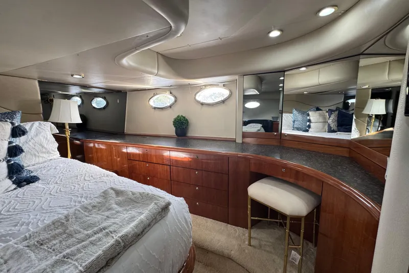 Slide: The Image of Luxurious cabin interior of 2000 Sunseeker Predator 56 yacht with elegant furnishings. - 28