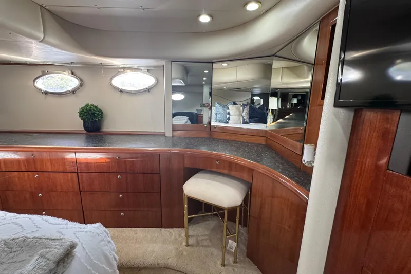 Slide: The Image of Luxurious interior of 2000 Sunseeker Predator 56 yacht with elegant wood cabinetry. - 29