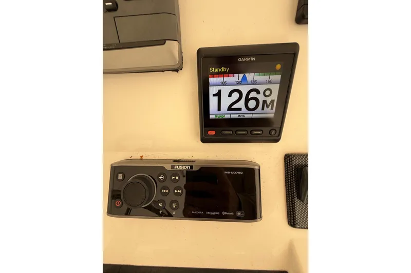 Slide: The Image of Garmin and Fusion marine electronics on 2015 Regulator 28 Forward Seating boat. - 52