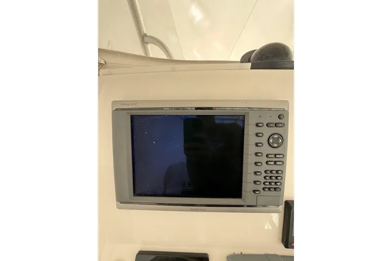 Slide: The Image of Garmin GPS display on 2015 Regulator 28 Forward Seating boat dashboard. - 53