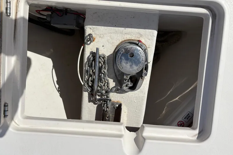 Slide: The Image of Anchor chain compartment of 2020 Cobia 240 Center Console boat. - 29