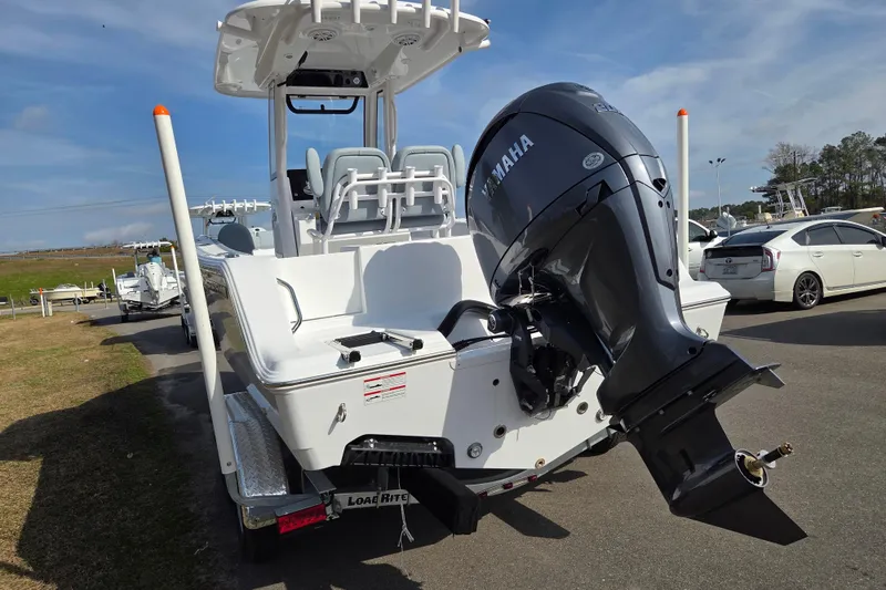 Slide: The Image of 2026 Sportsman Open 212 Center Console boat with Yamaha outboard motor. - 4