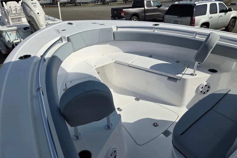 Slide: The Image of 2026 Sportsman Open 212 Center Console boat interior with seating and storage. - 8