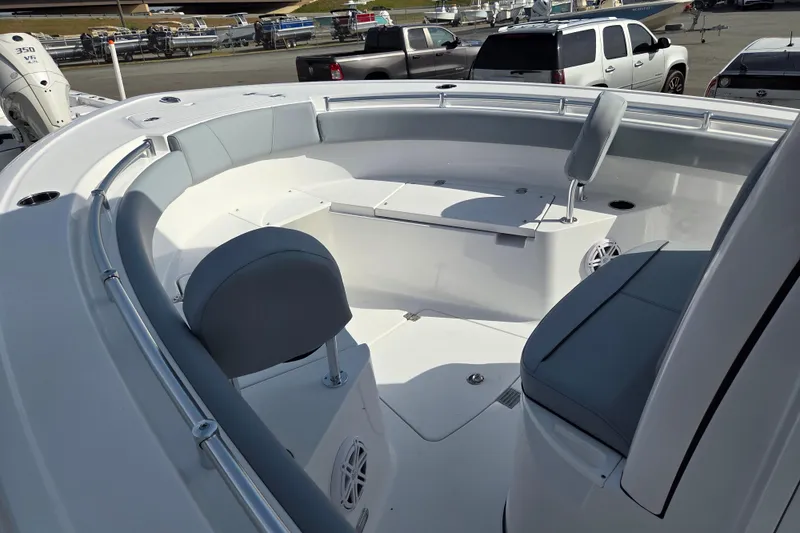 Slide: The Image of 2026 Sportsman Open 212 Center Console boat interior with seating and storage. - 9