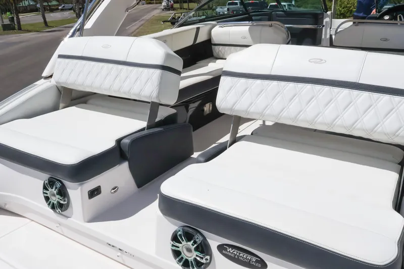 Slide: The Image of Interior of 2019 Regal 29 OBX with luxurious white seating. - 16