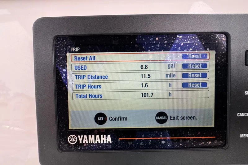 Slide: The Image of Yamaha trip display showing fuel usage and distance on 2019 Edgewater 230CC boat. - 44
