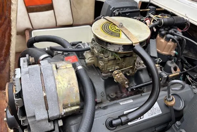 Slide: The Image of 1986 Galaxie Bowrider engine close-up, showcasing mechanical components and wiring. - 22