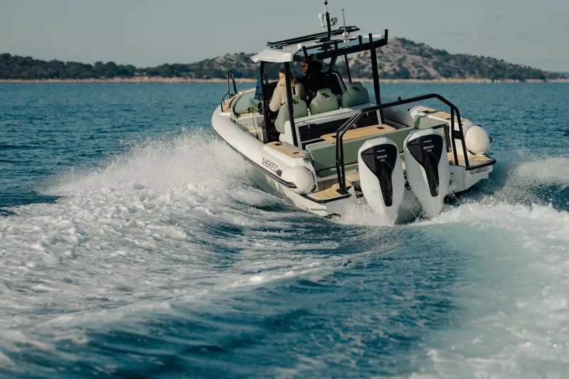 Slide: The Image of 2026 Highfield ADV7 boat cruising on open water with dual engines. - 2