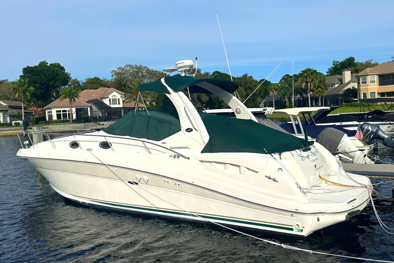 Slide: The Image of 2003 Sea Ray 340 Sundancer docked in a marina. - 3