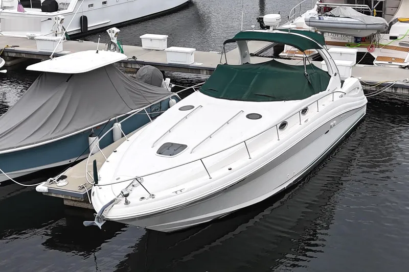 Slide: The Image of 2003 Sea Ray 340 Sundancer docked at marina. - 4