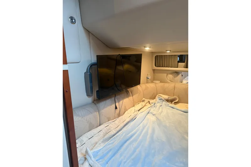 Slide: The Image of Interior of 2005 Chaparral Signature 350 with TV and cozy seating area. - 37