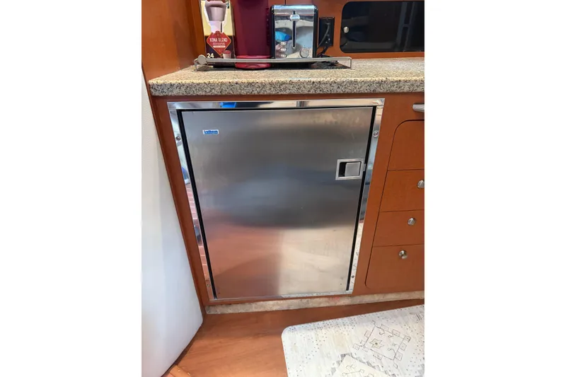 Slide: The Image of Stainless steel fridge in 2005 Chaparral Signature 350 yacht kitchen. - 39