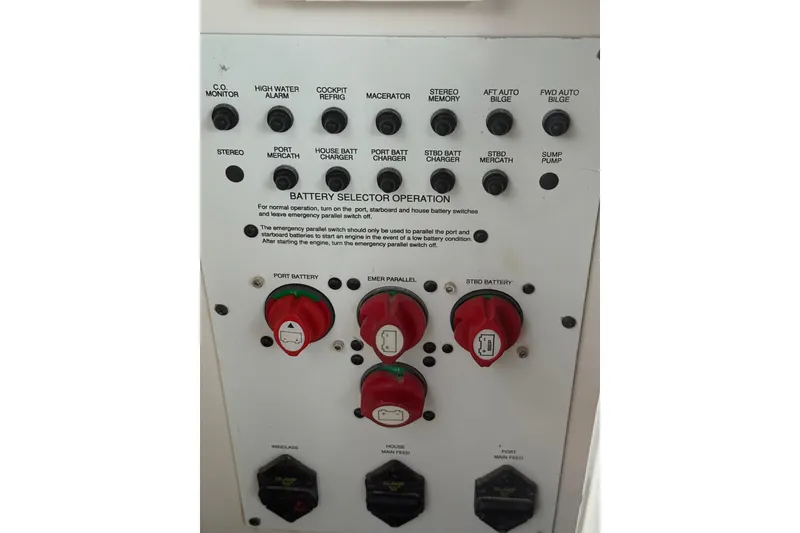 Slide: The Image of Control panel of a 2005 Chaparral Signature 350 boat with battery selector switches. - 46