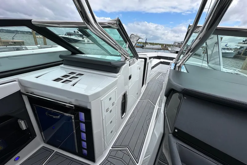 Slide: The Image of 2022 Monterey 378SS Super Sport boat interior with sleek design and modern amenities. - 11