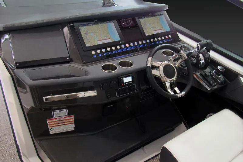 Slide: The Image of Manufacturer Provided Image: 2022 Monterey 378SS Super Sport boat dashboard with dual screens and modern controls. - 18