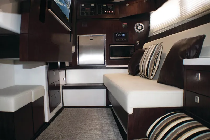 Slide: The Image of Manufacturer Provided Image: Interior of 2022 Monterey 378SS Super Sport boat with modern seating and appliances. - 22