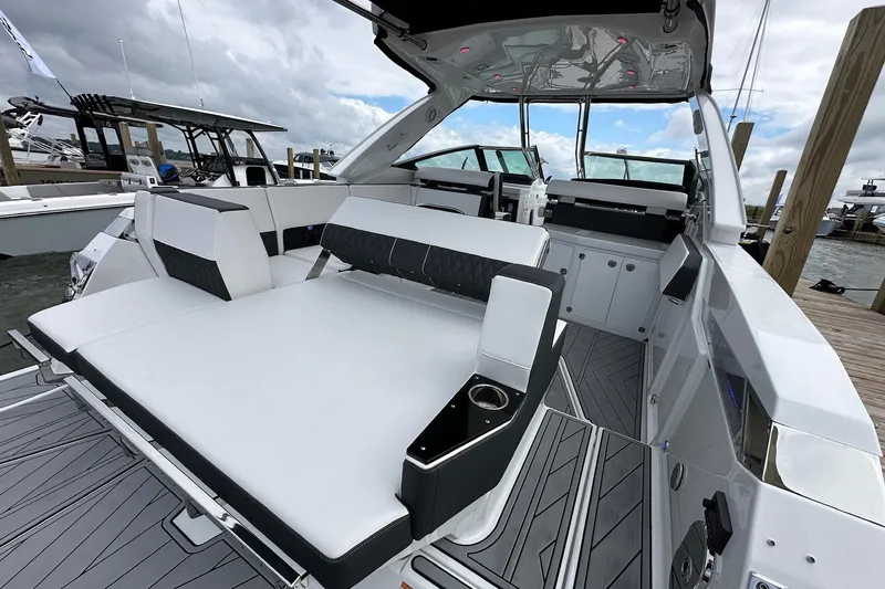 Slide: The Image of 2022 Monterey 378SS Super Sport boat interior with sleek seating and modern design. - 3