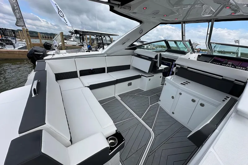 Slide: The Image of 2022 Monterey 378SS Super Sport boat interior with sleek seating and modern design. - 4