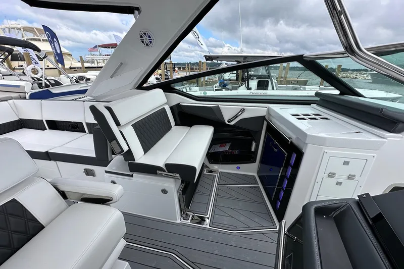 Slide: The Image of 2022 Monterey 378SS Super Sport boat interior with luxurious seating and modern design. - 9