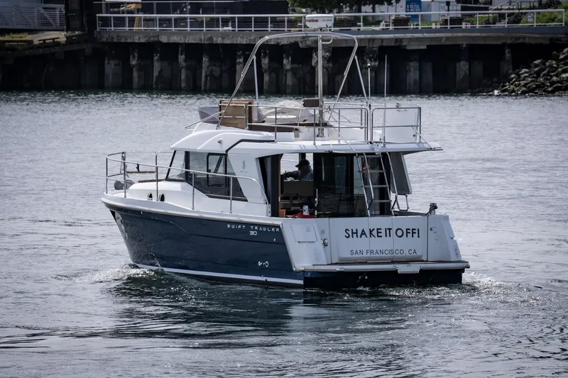 Slide: The Image of 2016 Beneteau Swift Trawler 30 cruising in San Francisco waters. - 2