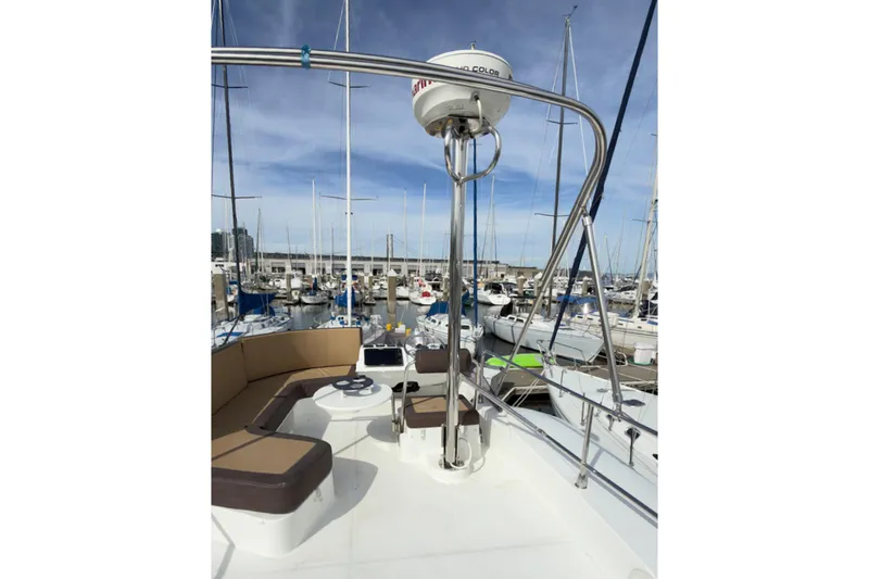Slide: The Image of Flybridge view of 2016 Beneteau Swift Trawler 30 in marina setting. - 40