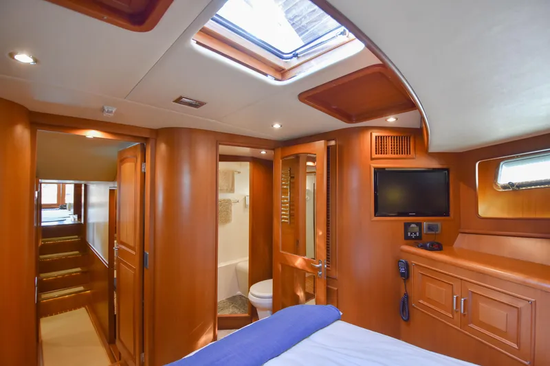 Slide: The Image of Luxurious interior of 2013 Fleming 55 yacht with wood paneling and modern amenities. - 15