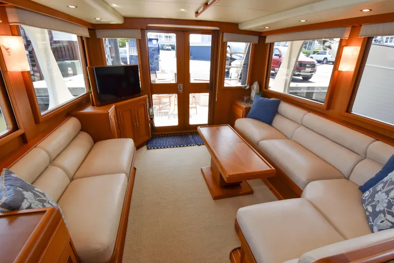 Slide: The Image of Luxurious interior of 2013 Fleming 55 yacht with plush seating and elegant wood finishes. - 3
