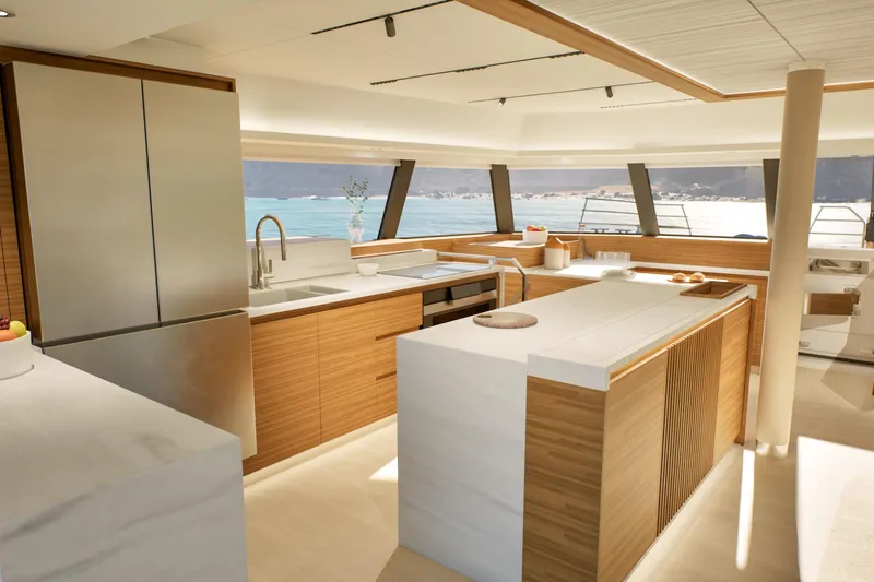 Slide: The Image of Luxurious kitchen interior of 2027 Fountaine Pajot FPY 70 yacht with ocean view. - 10