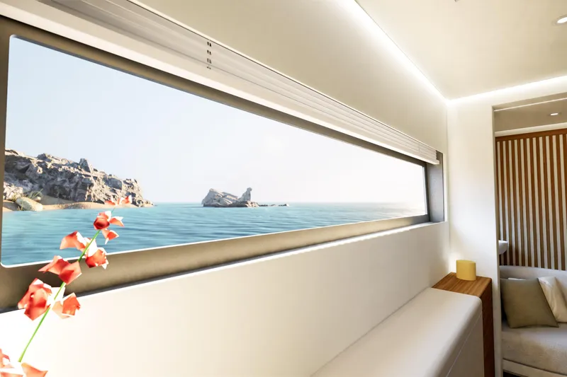Slide: The Image of Luxurious interior view from 2027 Fountaine Pajot FPY 70 yacht, overlooking serene ocean and rocky coastline. - 13