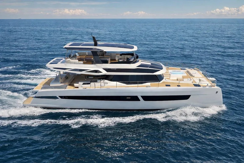 Slide: The Image of Luxurious 2027 Fountaine Pajot FPY 70 yacht cruising on open sea. - 22