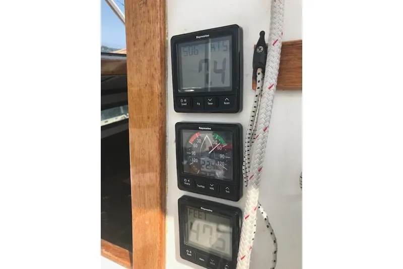 Slide: The Image of Digital navigation instruments on a 1989 Freedom 38 Sloop sailboat. - 27