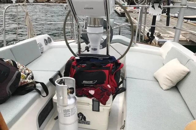 Slide: The Image of Cockpit of 1989 Freedom 38 Sloop with gear and seating, dockside view. - 33