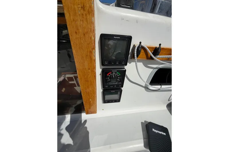 Slide: The Image of Control panel on 1989 Freedom 38 Sloop sailboat with Raymarine instruments. - 55